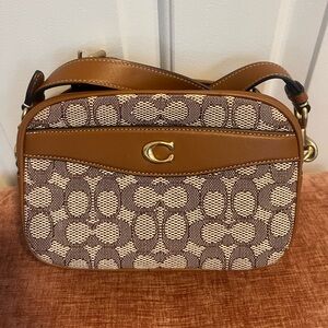 Coach crossbody with signature print.